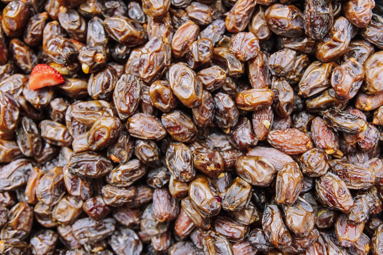 A detailed view of fresh and organic dried dates perfect for healthy snacking or cooking.
